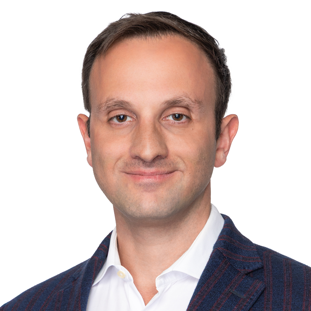 Headshot of Tughan Alioglu.